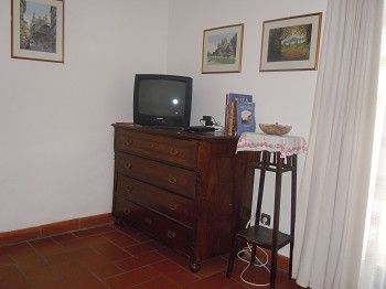 Wohn-Schlafzimmer mit Ausgang auf die Terrasse